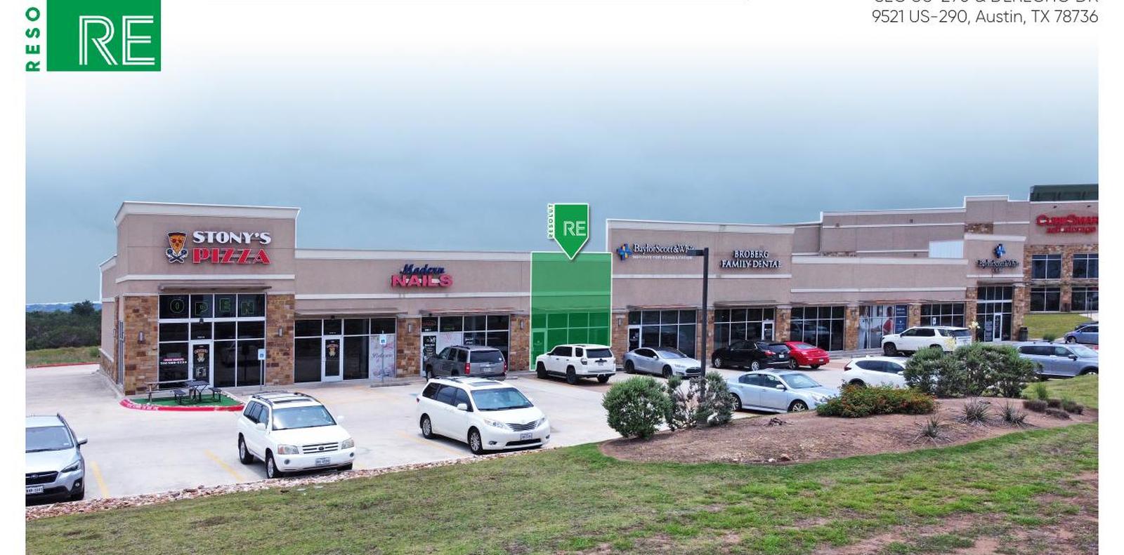 Southwest Center storefront facing the surface lot on US-290 in Oak Hill. The west corner restaurant and medical suites sit on one sidewalk in front of free surface parking.